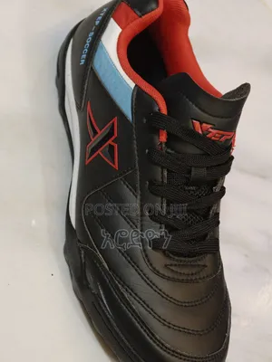 Football Shoe ታኬታ