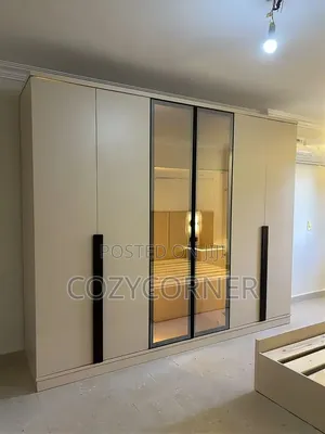 Laminated Wardrobes With Glass Doors Priced Per Square Meter. ቁምሳጥን