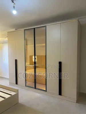 Laminated Wardrobes With Glass Doors Priced Per Square Meter. ቁምሳጥን