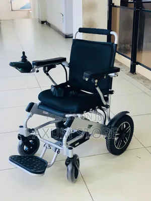 Compact Folding Powerchair — አነስተኛ ቦታ የሚይዝ የሚታጠፍ ዊልቸር