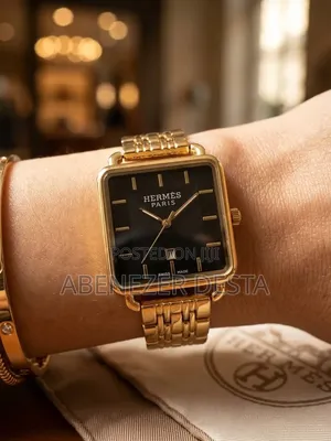 Hermès Paris Gold-Tone Square-Case Analog Watch Featuring a Black Dial