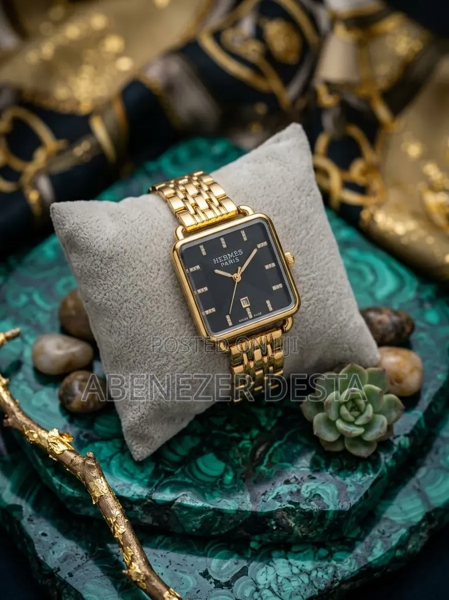 Hermès Paris Gold-Tone Square-Case Analog Watch Featuring a Black Dial
