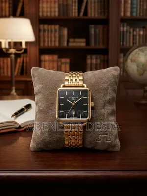 Hermès Paris Gold-Tone Square-Case Analog Watch Featuring a Black Dial