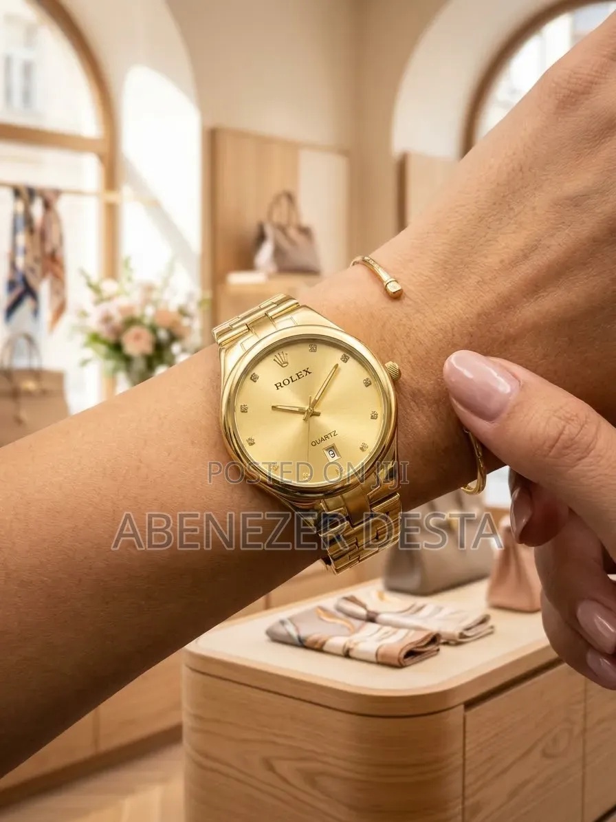 Rolex Classic Gold-Tone Quartz Dress Watch With a Gold-Colored Dial