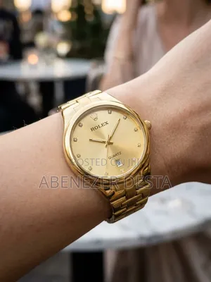 Rolex Classic Gold-Tone Quartz Dress Watch With a Gold-Colored Dial