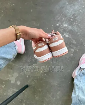 Shows the Nike Dunk Low "Rose Whisper" Women's Fashion Sneaker Shoe