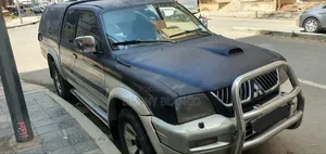 Mitsubishi L200 Club Cab 2.5 136hp 4WD 2005