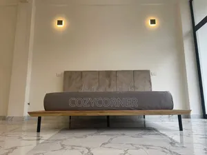 Simplified 1.50 Meter Bed Made of Australian Wood With Decent Price.