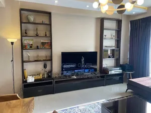 Simplified TV Stand With Functionality Priced Per Square Meters.