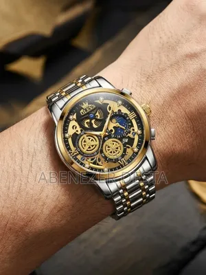 OLEVS 9947, a Two-Tone Gold and Silver Skeleton Quartz Chronograph