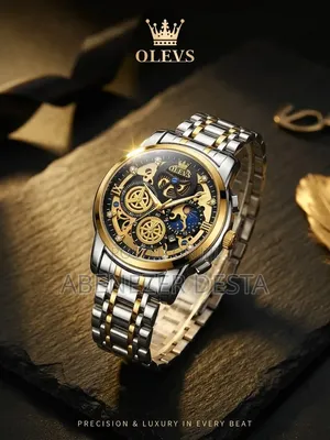 OLEVS 9947, a Two-Tone Gold and Silver Skeleton Quartz Chronograph