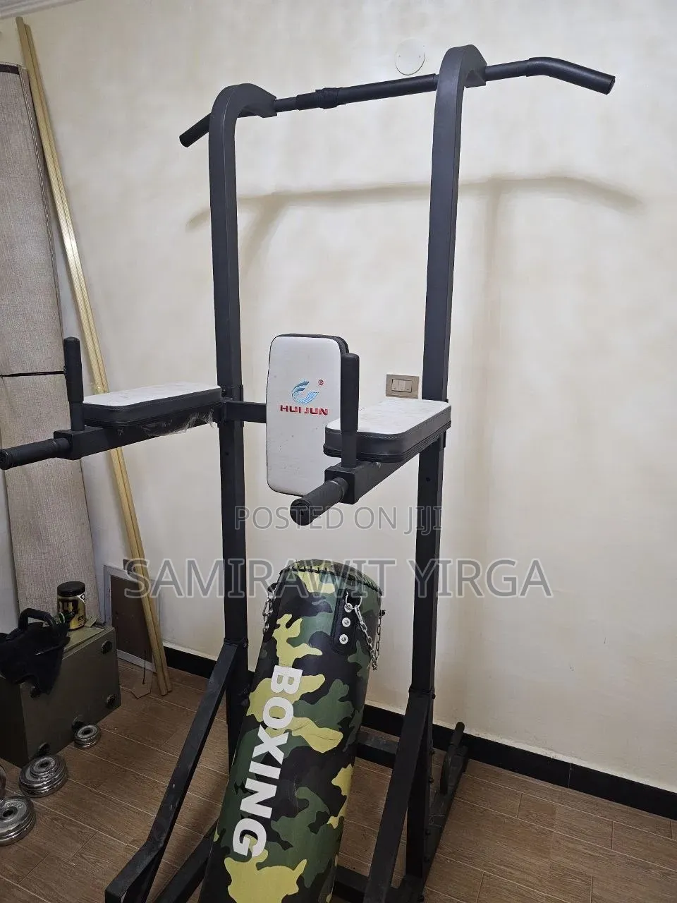 Hui Jun Power Tower With an Added Punching Bag