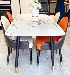 Multihued 4 Seaters Dining Table With Leather Chairs. የምግብ ጠረጴዛ