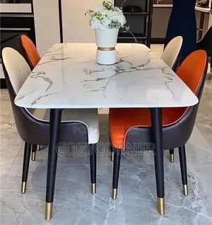 Multihued 4 Seaters Dining Table With Leather Chairs. የምግብ ጠረጴዛ