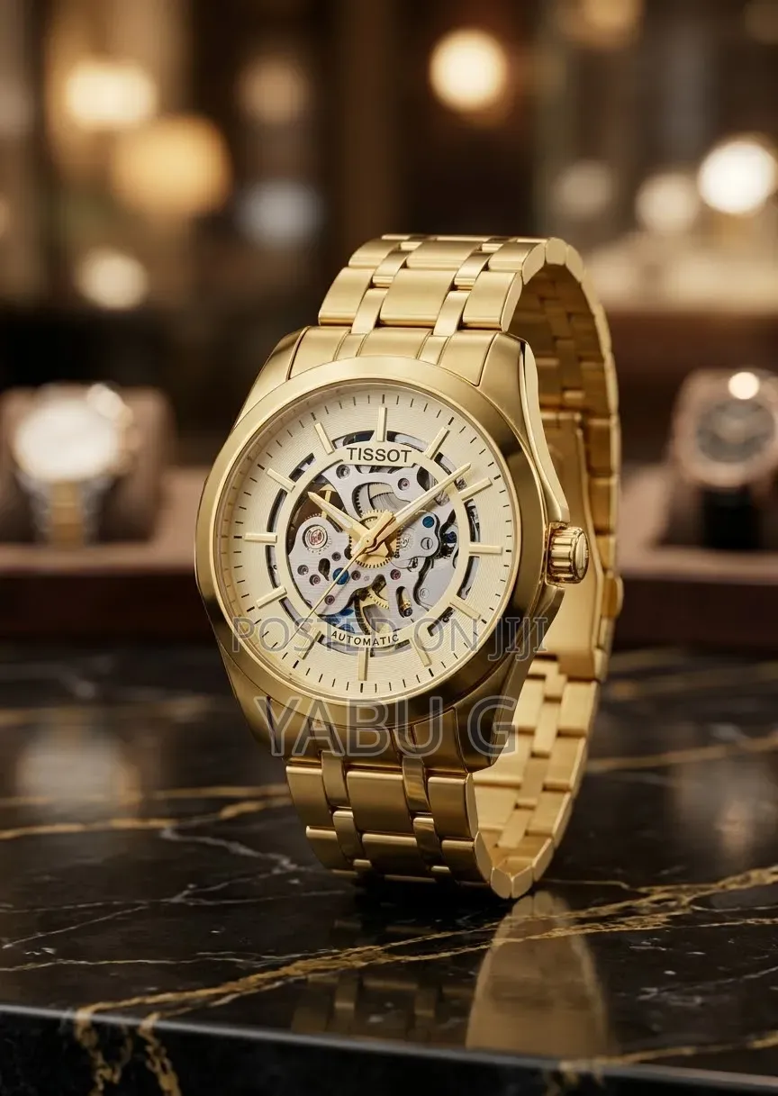 Gold-Toned Tissot Automatic Men's Watch Featuring a Skeleton Dial