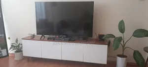 Slightly Used TV With TV Stand