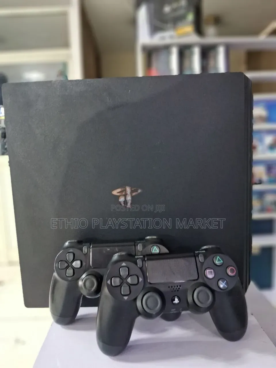 PS4 Slim With Two Black Controllers. 