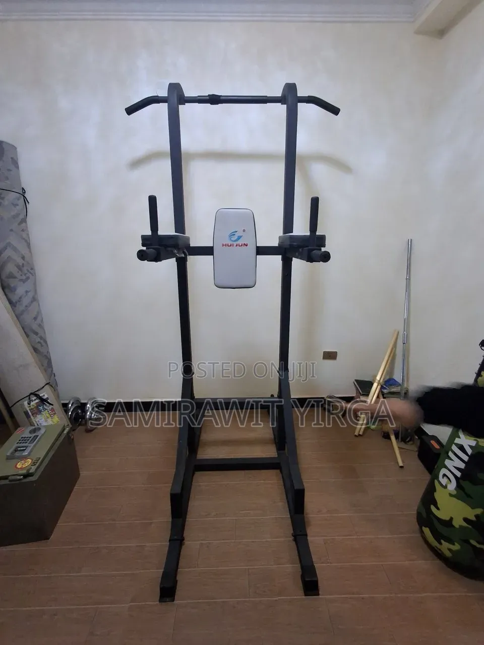 Hui Jun Power Tower With an Added Punching Bag