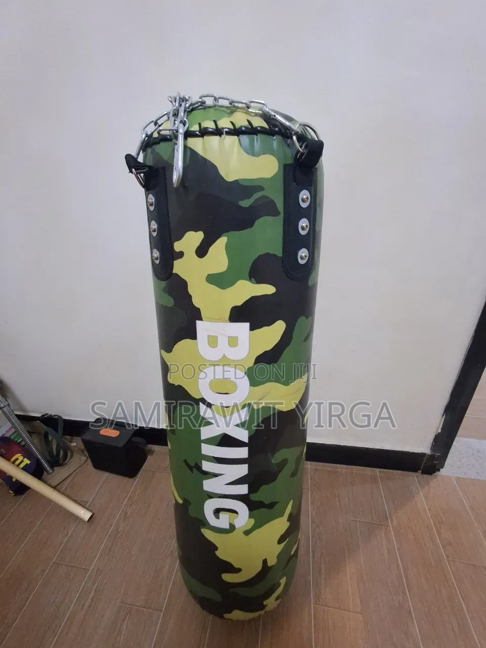 Hui Jun Power Tower With an Added Punching Bag