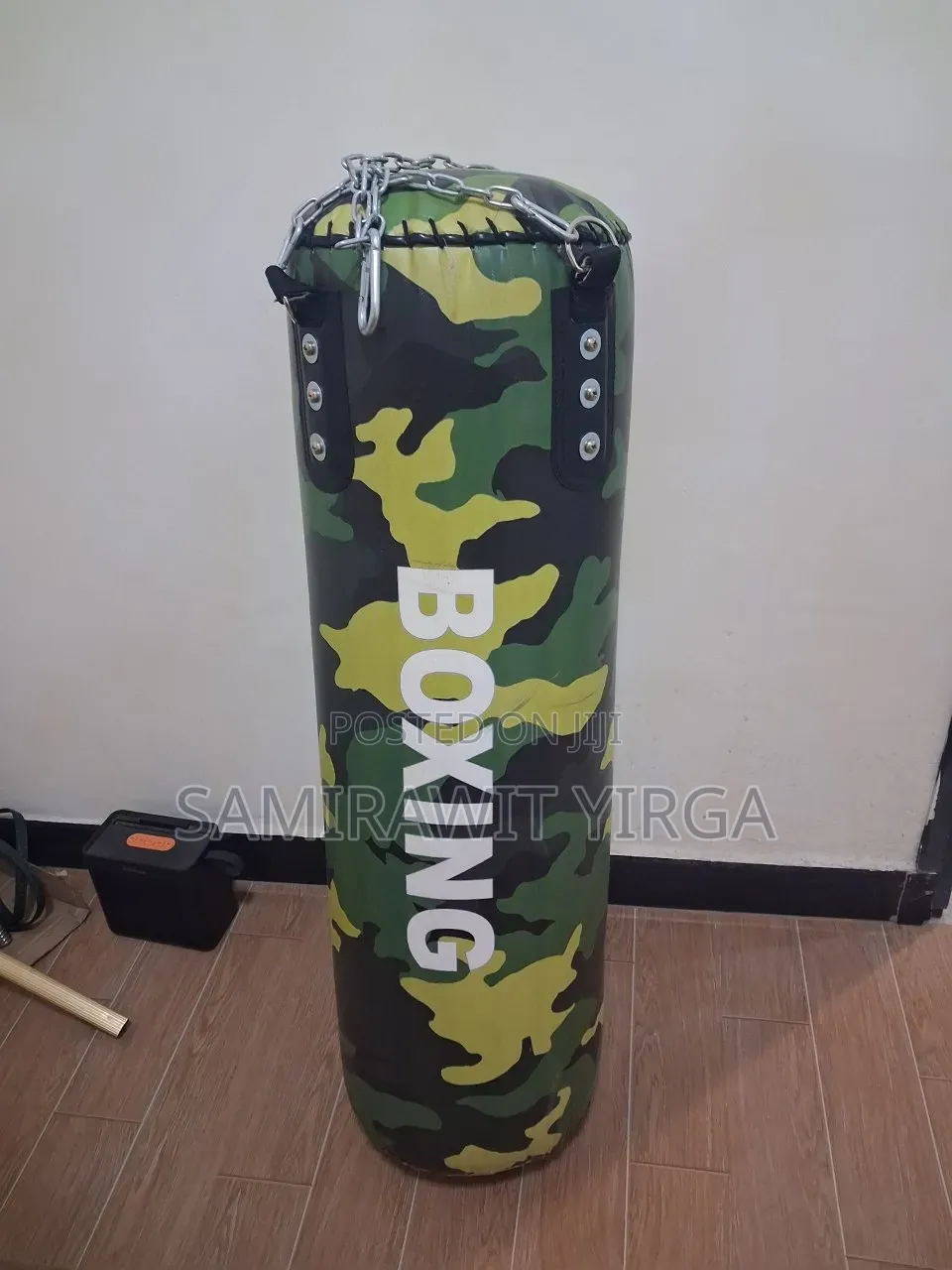 Hui Jun Power Tower With an Added Punching Bag