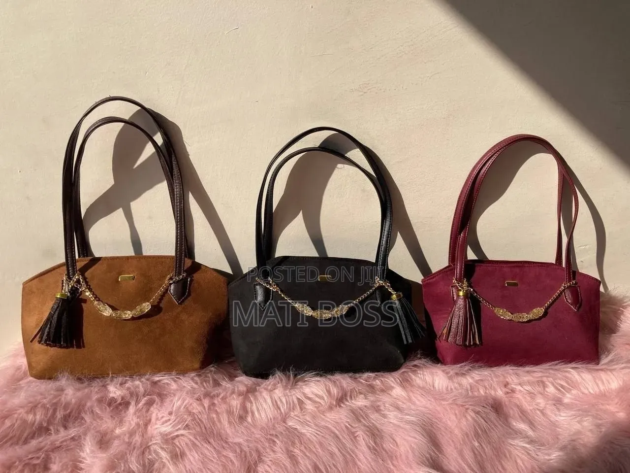 Stylish Women's Handbags in Black, Brown and Burgundy With Gold Chains