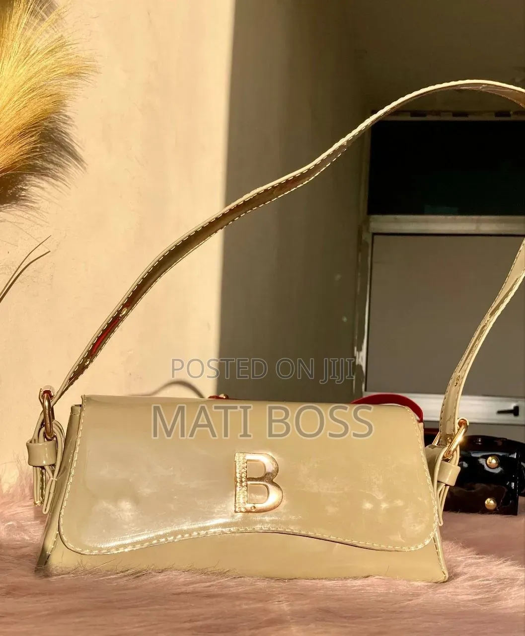 Stylish Women's Handbags in Black, Brown and Burgundy With Gold Chains