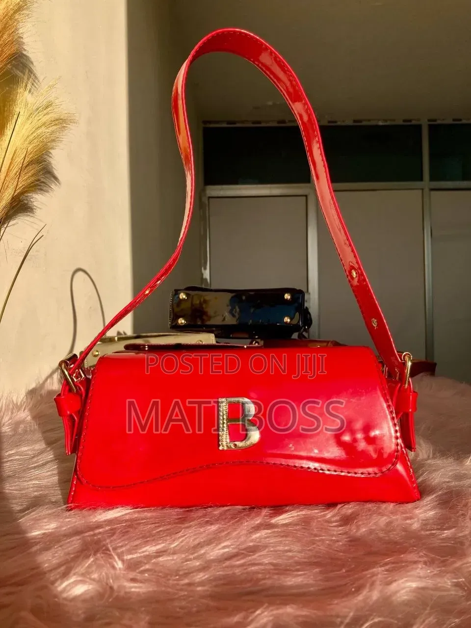 Stylish Women's Handbags in Black, Brown and Burgundy With Gold Chains
