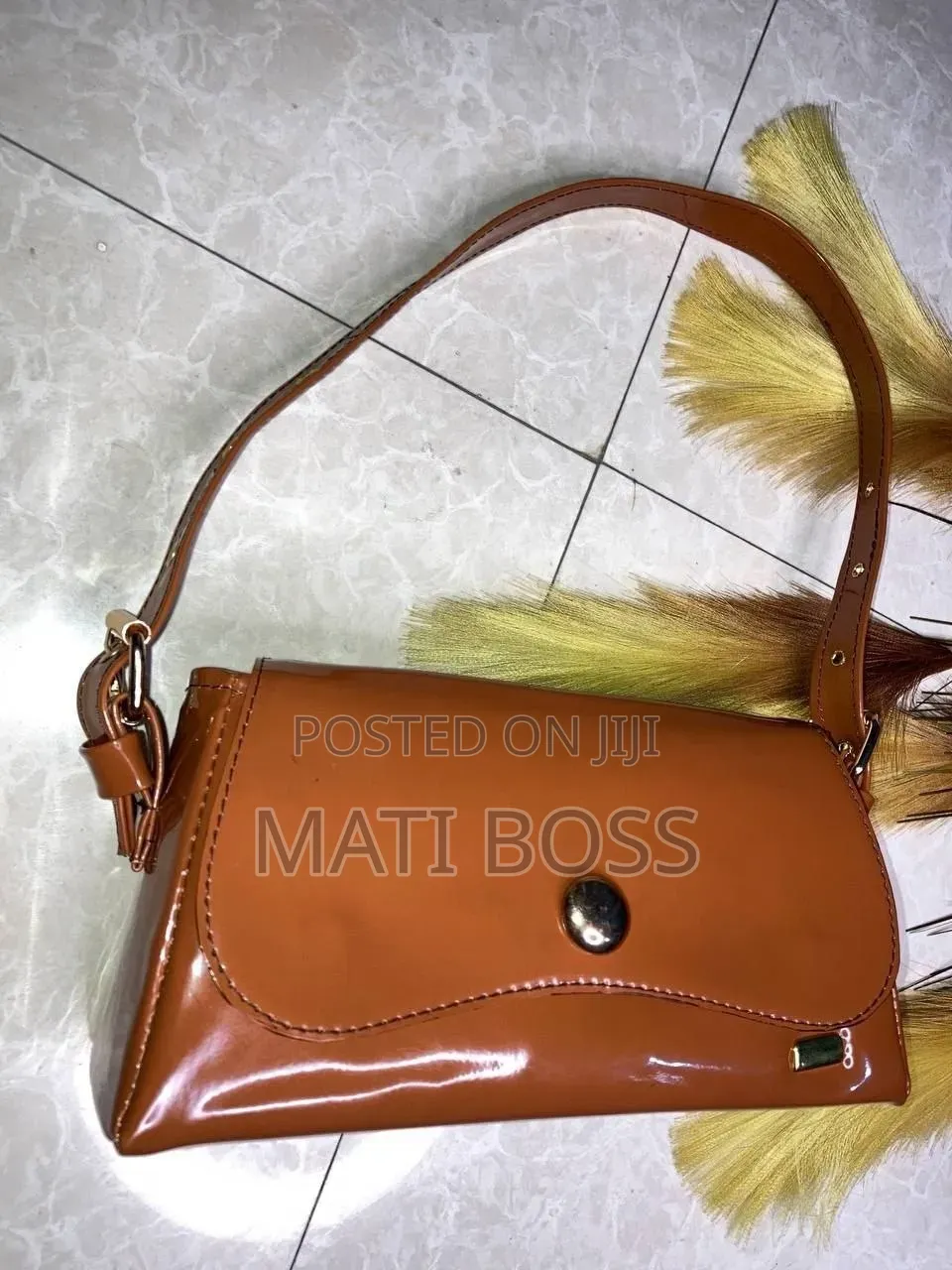 Stylish Women's Handbags in Black, Brown and Burgundy With Gold Chains