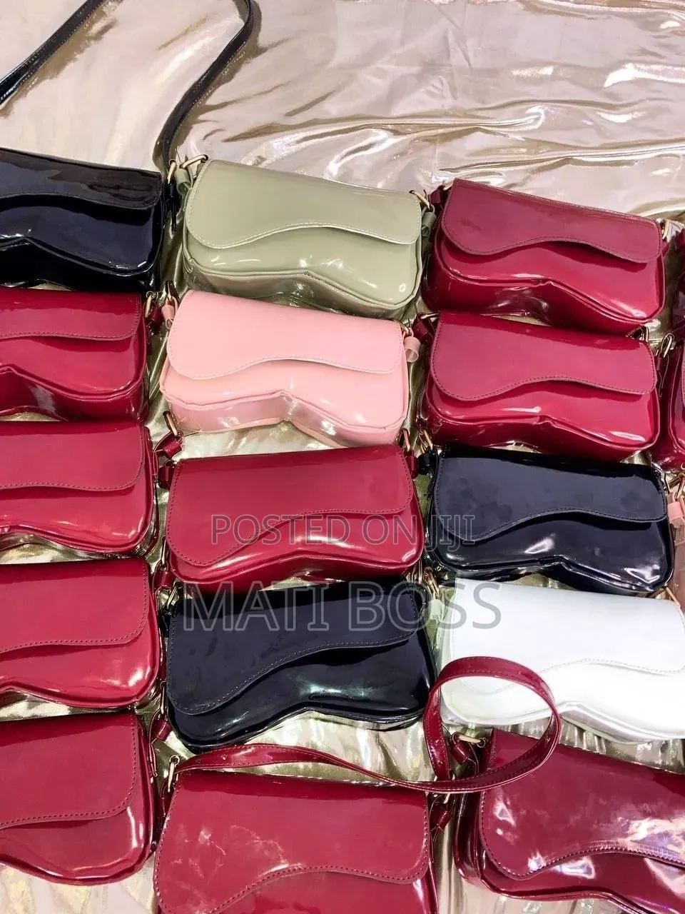 Stylish Women's Handbags in Black, Brown and Burgundy With Gold Chains