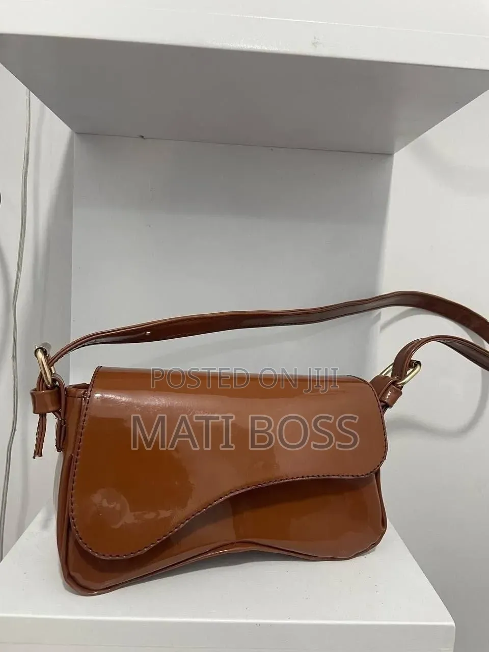Stylish Women's Handbags in Black, Brown and Burgundy With Gold Chains