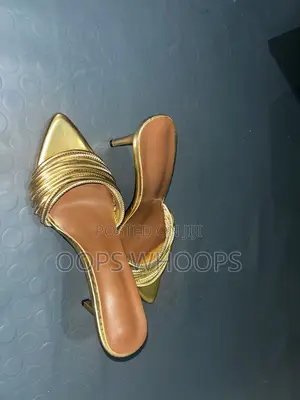 Heel Golden Shoe