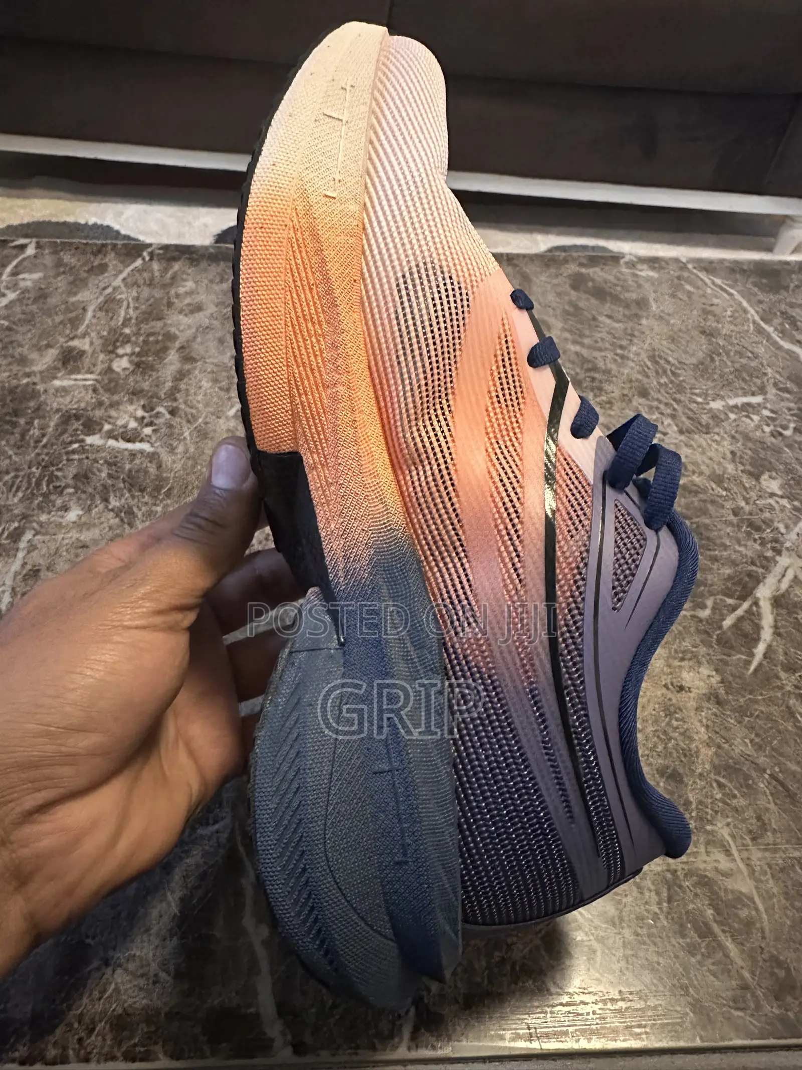 “Super Strike Pro 3.0.”. Breathable Mesh. Navy Blue and Peach/Orange