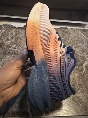 “Super Strike Pro 3.0.”. Breathable Mesh. Navy Blue and Peach/Orange