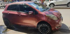 Photo - Toyota Yaris 2010 Burgundy