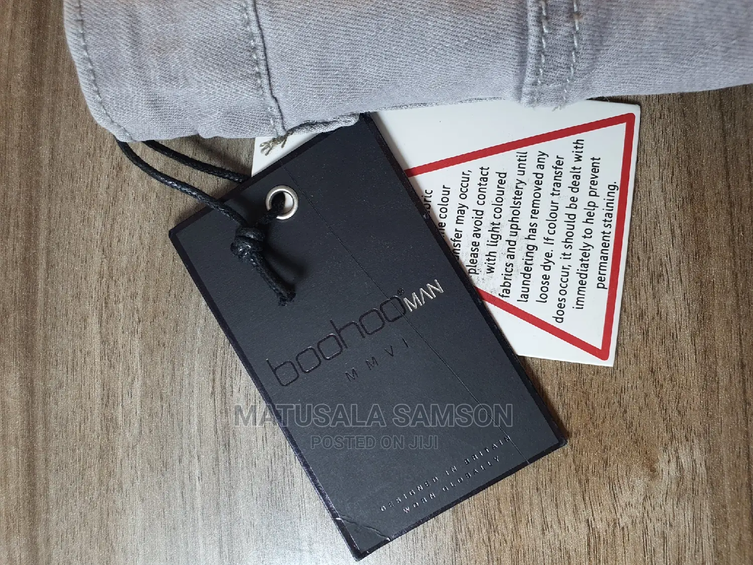 Boohoo Man Designed in Britian Worn Globaly