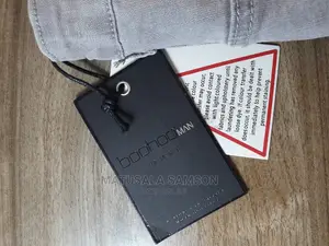 Boohoo Man Designed in Britian Worn Globaly