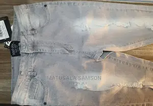 Boohoo Man Designed in Britian Worn Globaly