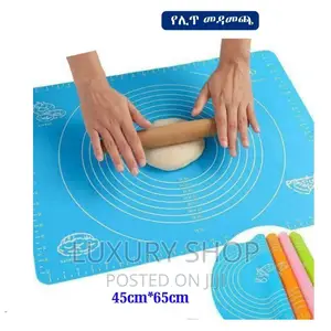 Photo - ከሲልከን ጎማ የተሰራ የሊጥ መዳመጫ(Non Stick Silcon)