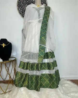 Photo - Traditional Clothes የባህል ልብስ Habesha Kemis ሀበሻ ቀሚስ