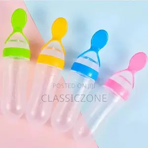 Silcone Bottle Spoon Feeder