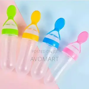 Silcone Bottle Spoon Feeder