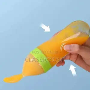 Silcone Bottle Spoon Feeder
