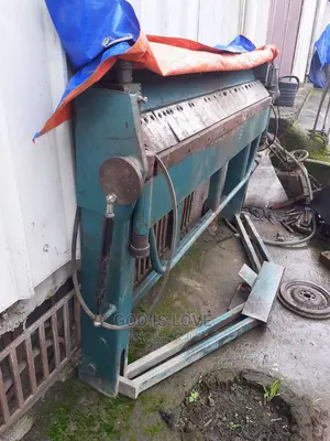 ላሜራ ማጠፊያ ማሽን