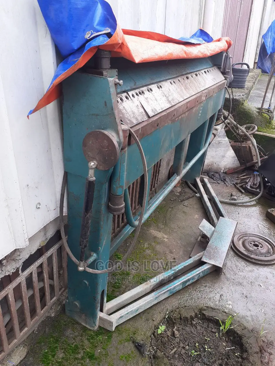 ላሜራ ማጠፊያ ማሽን