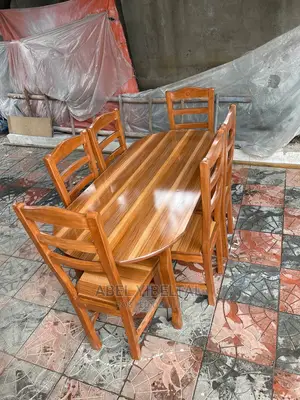 Photo - ከ ዋንዛ የተሰራ ባለ 6 ወንበር ጠረፔዛ