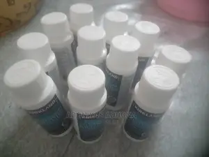 Photo - Minoxidil, Derma Roller and Neo Hair Lotion.