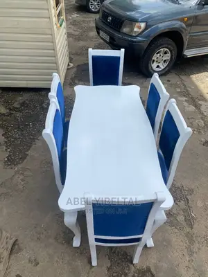 ከዋንዛ የተሰራ እና ውብ ባለ 6 የጨርቅ ወንበር ጠረጴዛ ! 