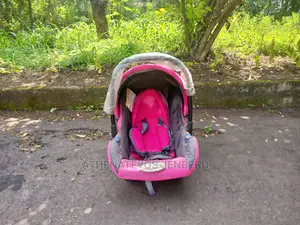 Photo - Pink Car Seat for Children