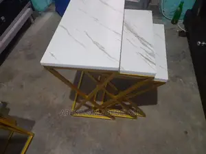 ባለ ሦስት ኮፊ ቴብል