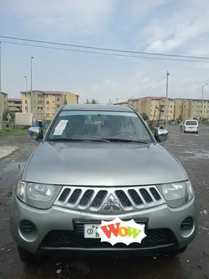 Photo - Mitsubishi L200 Double Cab 2.5 180hp 4WD 2008 Gray